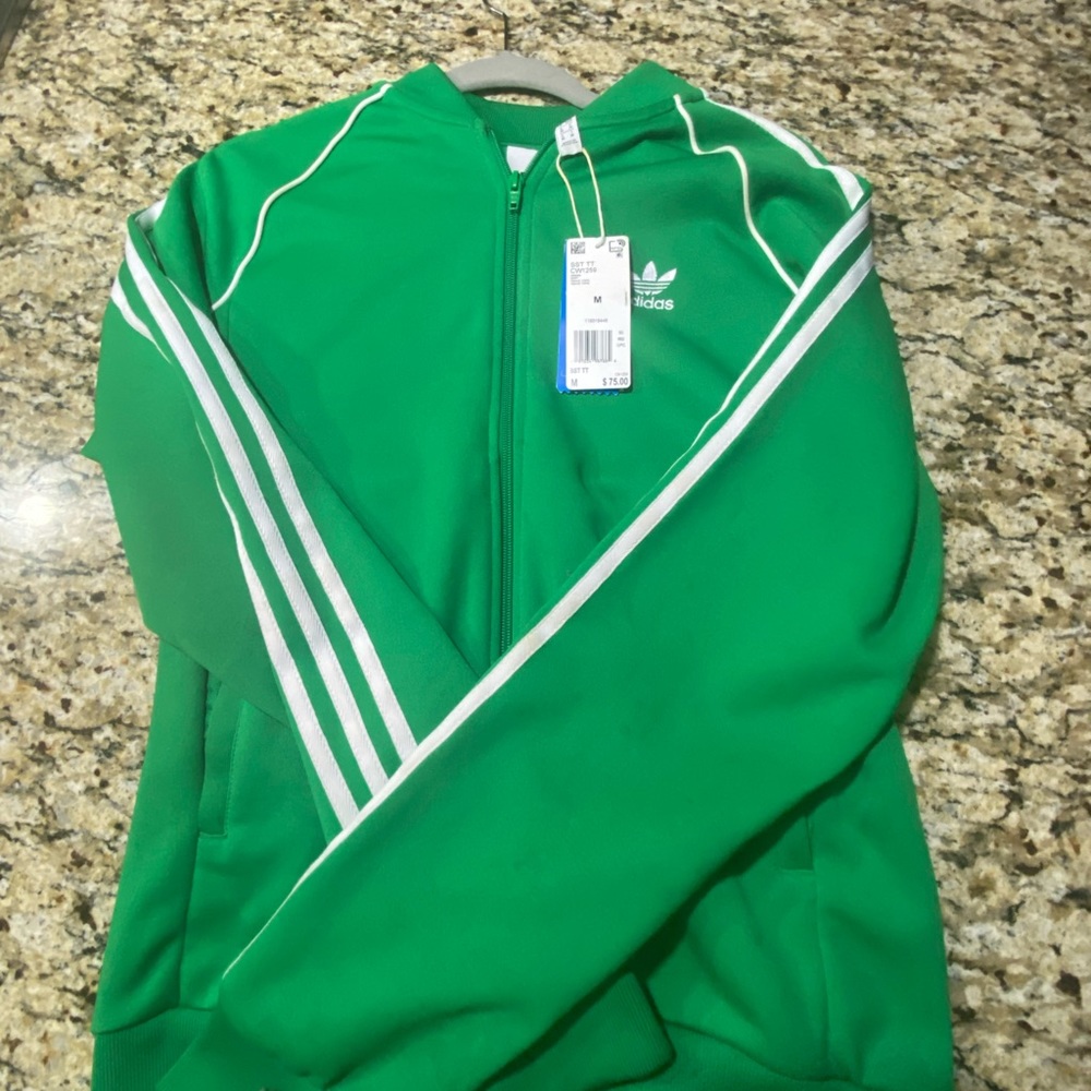 green and white adidas zip up